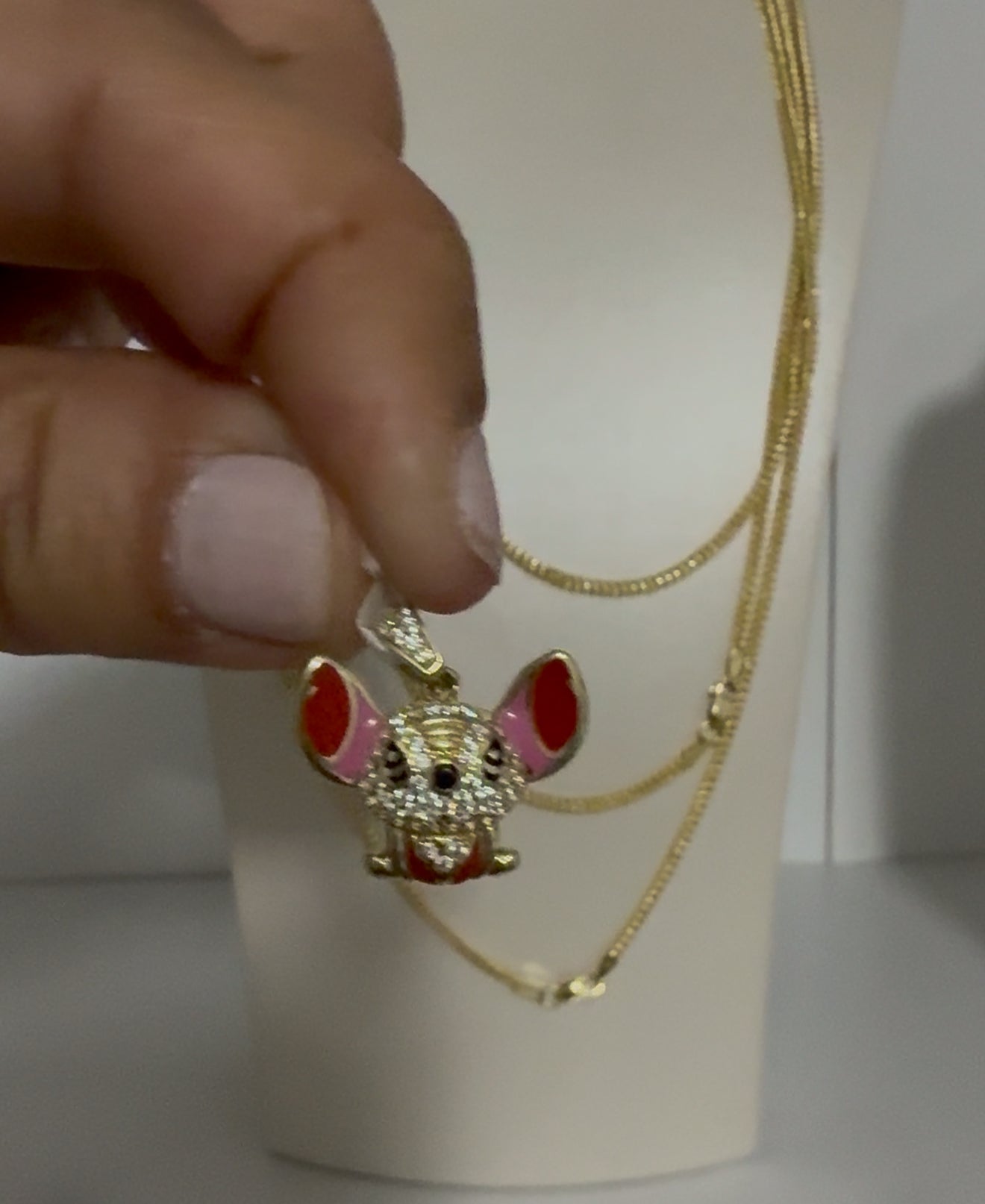 10k gold Stitch pendant with zirconia for women