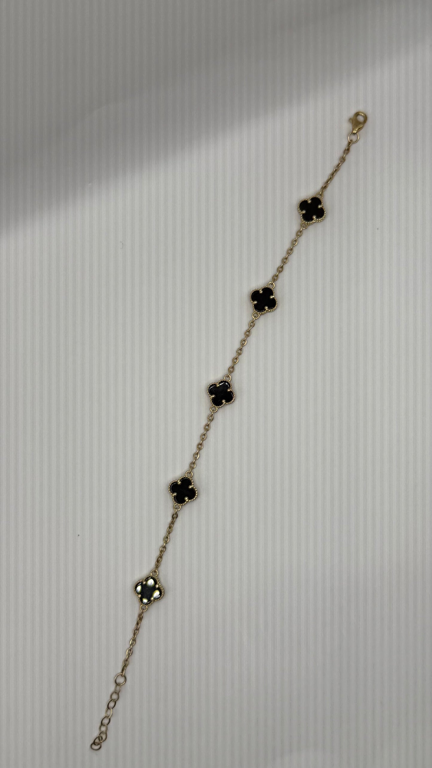 10k gold clover bracelet with 5 black flowers, size 8 for women