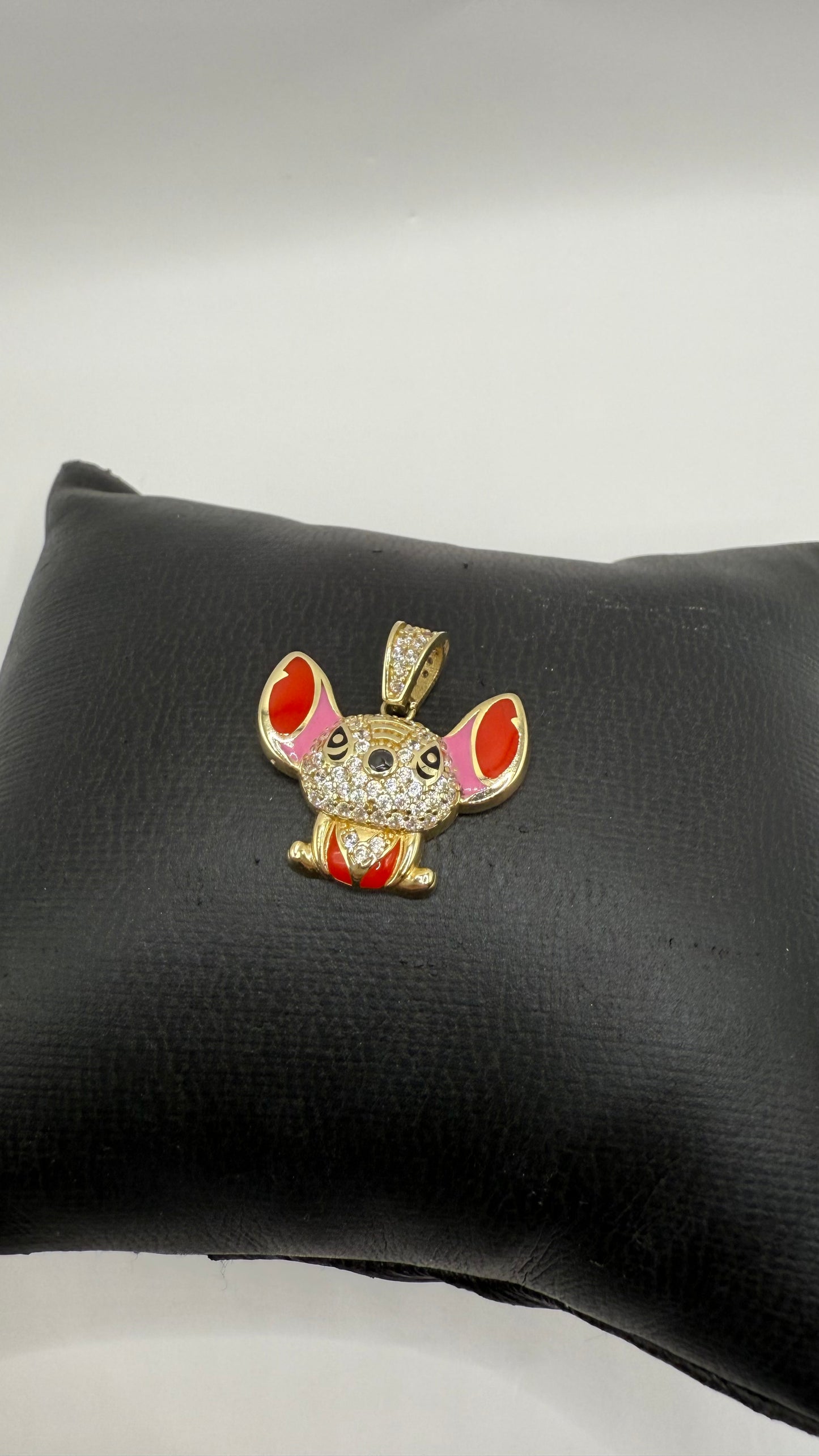 10k gold Stitch pendant with zirconia for women